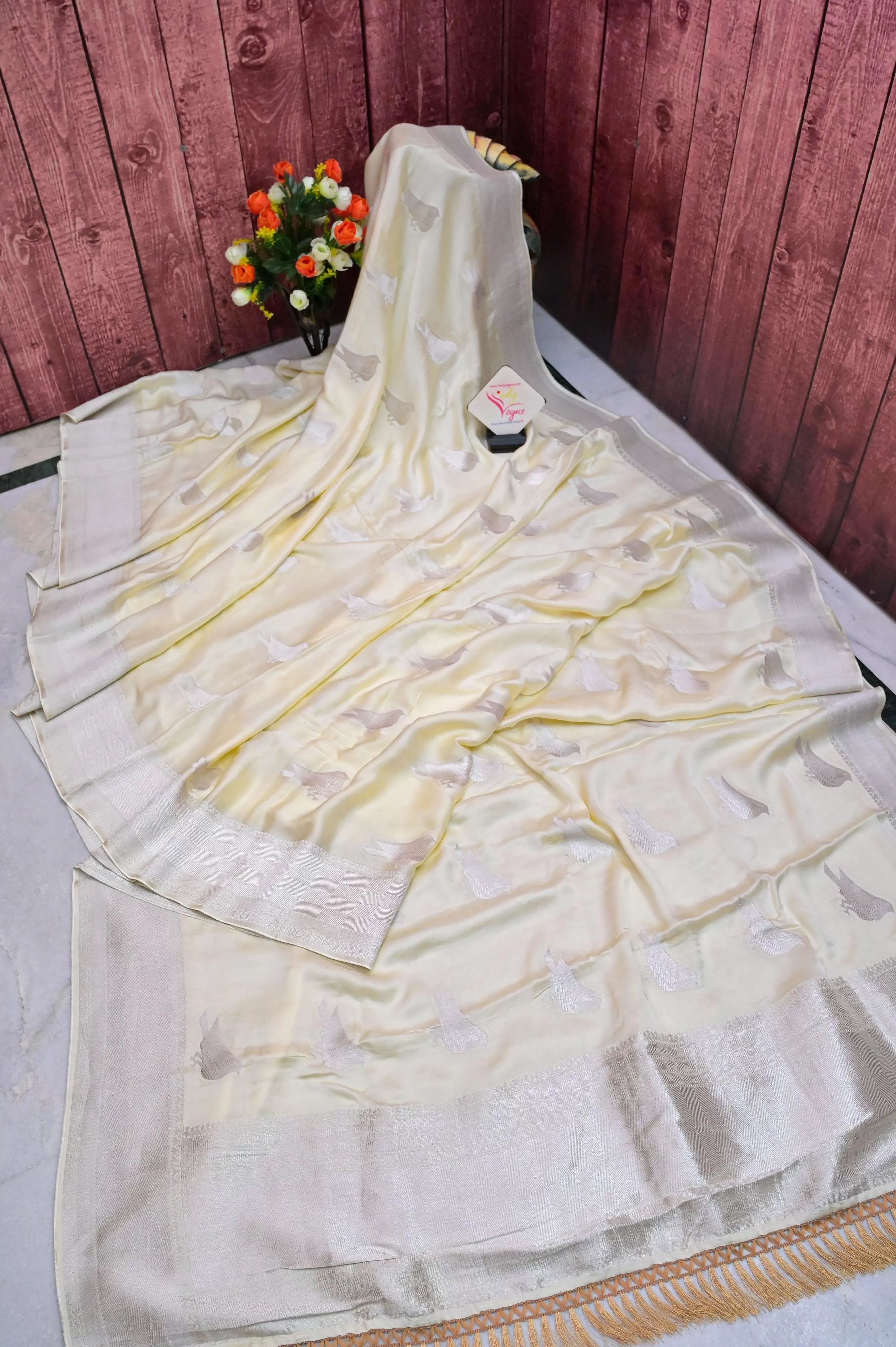 Offwhite Color Satin Banarasi Silk with Silver Zari Bird Motif Work